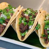 Tacos (3) · 3 Soft corn tortilla with your choice of steak, chicken, carnitas or al pastor onios & cilan...