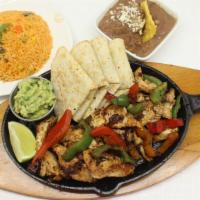 Chicken Fajitas · Grilled chicken with onions, green & red peppers , side of tortillas, mexican rice & refried...