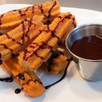 Churros Mexican · 2  Mexican churros with chocolate syrup