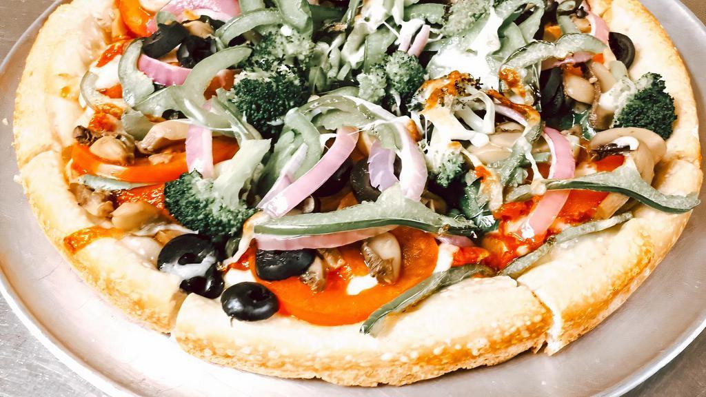 The Ultimate Veggie · Baby spinach, broccoli, mushrooms, tomatoes, red onions, green peppers, olives, sauce & cheese.