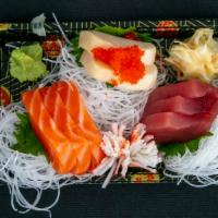 Sashimi Appetizer · Assorted filets of raw fish.