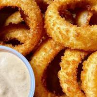 Onion Rings · 12 pieces. Fried battered onion.