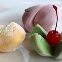 Mochi Ice Cream · Japanese style sticky rice cake formed around an ice cream choice of strawberry, vanilla, gr...