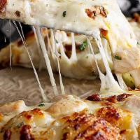 Garlic Pizza · Creamy garlic sauce, onions, mushrooms, chunks of garlic, & feta cheese.