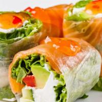 Salmon Summer Rolls · Yummy salmon filled and rolled stuffed rolls with rice vermicelli noodles with fresh herbs.