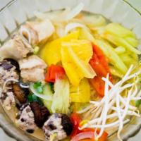 Taro Root Noodle Bowl · Delicious vermicelli noodles topped with fresh vegetables and herbs topped with fresh taro r...