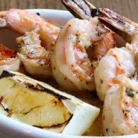 Wood Fired Shrimp · Roasted garlic butter, white wine, and grilled lemon.