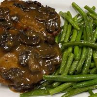 Grilled Meatloaf · Mushroom gravy, mashed potatoes, green beans.