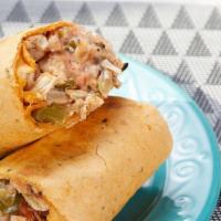 Tex-Mex Fajita Wrap · Chicken or steak, sautéed green peppers, and onions, cheddar cheese, sour cream and salsa in...