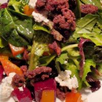 Caprino · mixed greens, goat cheese, candied walnuts, red & golden beets, sherry vinaigrette