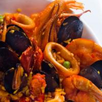 Paella Marinera Artesanal · For 2 people Traditional Lobster, Shrimps, Calamari and clams.