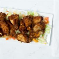 Ixtapa Wings (8) · For those who love buffalo wings, spice up your night! Choice of bone in or boneless.