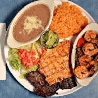 Tres Amigos · A charbroiled marinated steak with juicy, grilled chicken breast accompanied by fresh jumbo ...