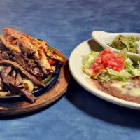 Fajitas · Choose between, shrimp, steak, or chicken. Served with rice, beans, warm tortillas, cheese, ...