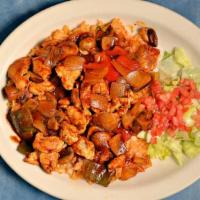 Arroz Con Pollo · Chicken breast sautéed in a special sauce with mushrooms, onions and bell peppers. Served ov...