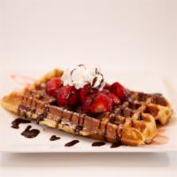 Strawberry Waffle · Freshly made Belgium waffle strawberries, strawberry syrup, and chocolate syrup on the side