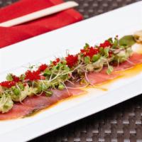 Carpaccio : Hamachi · sashimi + ponzu, wasabi tobiko, microgreens, scalions & soyu jalapeño