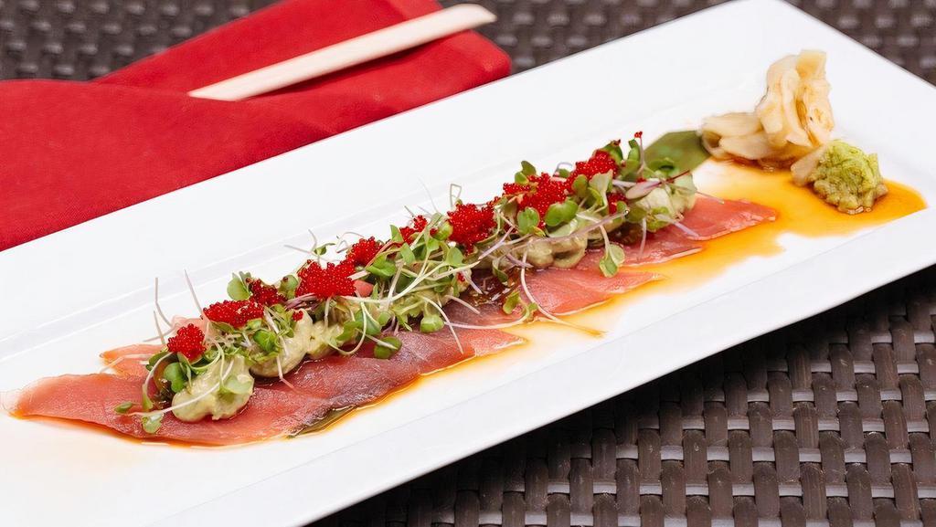 Carpaccio : Tuna · sashimi + ponzu, wasabi tobiko, microgreens, scalions & soyu jalapeño