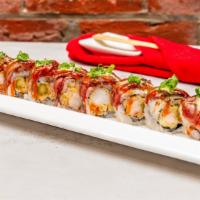 Surf And Turf Roll · asparagus & shrimp tempura inside roll; topped o  w/seared sirloin steak, wasabi aoli, hot s...
