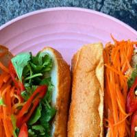  Bbq Tofu Banh Mi · Caramelized onion spread, cucumbers, cilantro, pickled carrots, pickled red chiles. (Vegan)