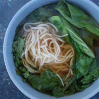 Vegetable Noodle Soup · Wheat noodles in a light vegetable broth with herbs & seasonal greens