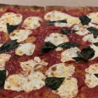 Brooklyn Margherita Pizza · Homemade special plum tomato sauce, Fresh Mozzarella, Fresh Basil & Extra Virgin Olive Oil.