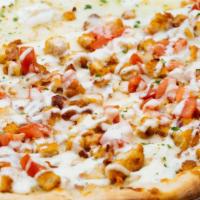 Chicken Ranch Pizza · Chopped homemade fried chicken cutlets, mozzarella bacon, tomato and ranch.