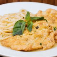 Chicken Francaise · Breast of chicken dipped in an egg and parmesan cheese batter then sauteed with butter and f...