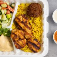 Classy Chicken Bowl · Skewered pieces of chicken breast marinated in a mediterranean blend of herbs and spices ser...