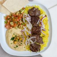 King Beef Bowl · Skewered pieces of top sirloin marinated in a blend of herbs and spices served with yellow r...