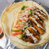 Chicken Wrap · Chicken pieces marinated in various spices, lemon, olive oil and grilled on a charcoal broil...