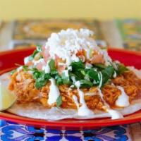Al Pastor Tacos · Fried pork with pineapples and onions. All tacos are topped with chopped onions and cilantro...