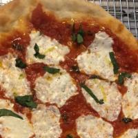 Margherita Little Round Pizza · Fresh mozzarella, tomato sauce, basil, and extra virgin olive oil.