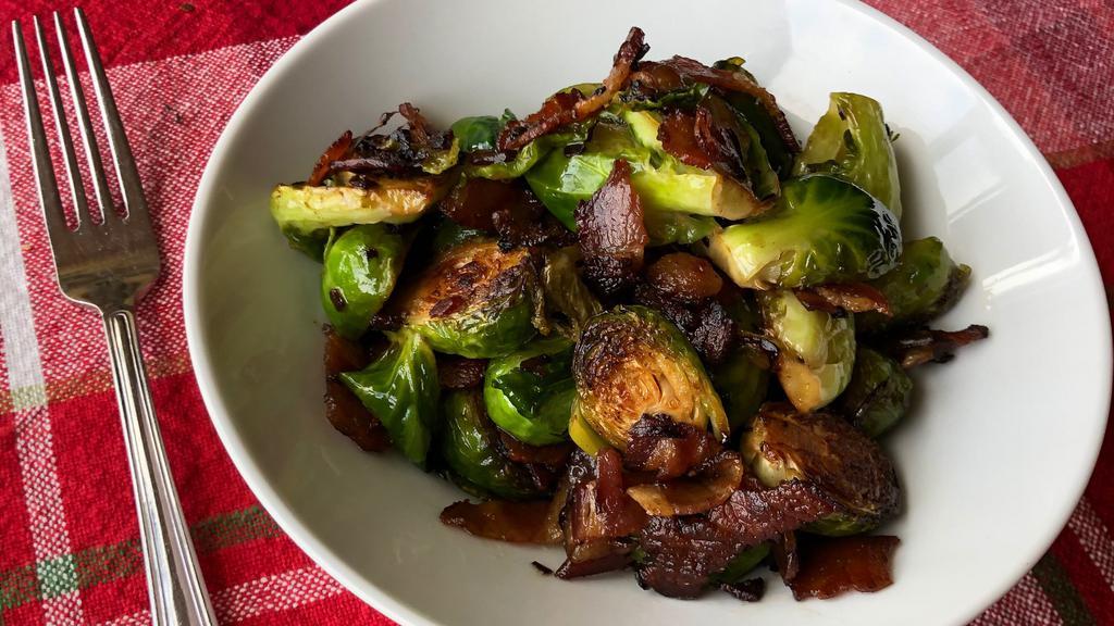 Brussels Sprouts · Pan seared with butter, bacon, and shallots.