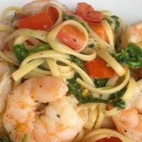 Gamberetti · Linguine with sauteed shrimp, fresh tomato, arugula, oil, garlic, and white wine.