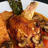 Rosemarino · Pan seared, skin-on chicken breast, oven roasted tomato, mushroom, grilled asparagus, and ri...