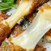 Mozzarella Sticks · hand cut mozzarella breaded with homemade breadcrumbs, fried, served with tomato sauce