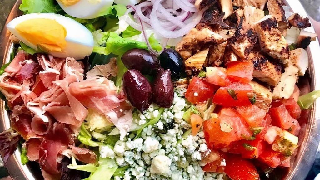 Italian Cobb Salad · grilled chicken, proscuitto, crumbled gorgonzola, hard boiled egg, red onions, marinated tomatoes, creamy gorgonzola dressing