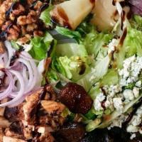 Monte Carlo Salad · grilled chicken, poached pears, figs, crumbled gorgonzola, red onions, candied walnuts, mixe...