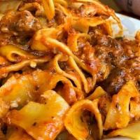 Pasta Bolognese · slow cooked meat sauce