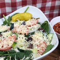 Asiago Spinach Salad · Fresh Baby Spinach, Fresh Sliced Tomatoes, Onions, Cucumbers, Peperochinis, Kalamata Olives,...