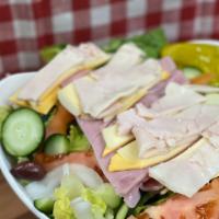 Chef Salad · Sliced turkey breast, ham, provolone & american cheese on top of crisp lettuce, sliced red r...