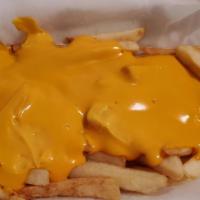 Cheese Fries · Mouth watering crispy golden brown fries smothered in warm cheese sauce.