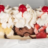 3 Scoops Banana Split · 3 Scoops of your choice of Hard Ice cream, topped with Strawberries, Hot Fudge, Pineapples, ...