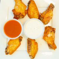 Chicken Wings · Hot, mild, BBQ sauce, or garlic parmesan. Served with blue cheese or ranch.