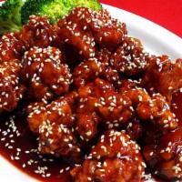 #16. Sesame Chicken Combination Platter · Served with Roast Pork Fried Rice and Egg Roll