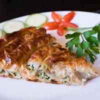  Homemade Bosnian Borek (V) · Phyllo roll stuffed with spinach or meat and feta Tray.