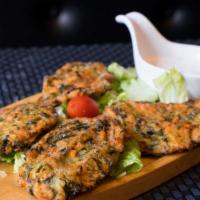  Zucchini Pancakes (Mucver) (V) · Quick fried vegetarian cakes drizzled with Paprica yogurt sauce.