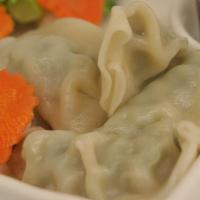 Gyoza (6) · Pork and vegetable dumplings served with a sweet soy sauce.
