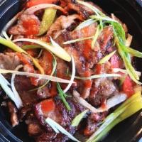 Beef Bulgogi · A dish of thinly sliced grilled steak. that has been marinated in house special sauce. with ...